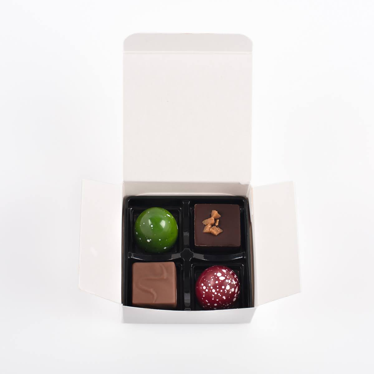 Customized white box of 4 chocolates